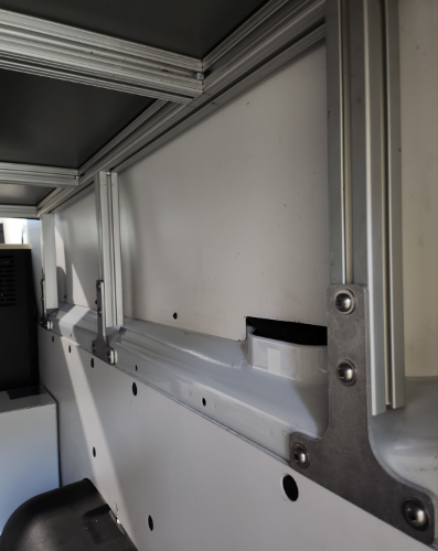 Close up of cargo tie tabs in a Transit Van