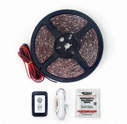 LED strip light kit with remote control, cable, and alcohol wipes on a white background