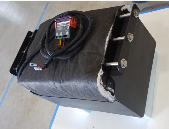 Preloaded under vehicle battery box for Sprinter NCV3 and VS30